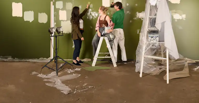 Co-own-friends-painting-wall