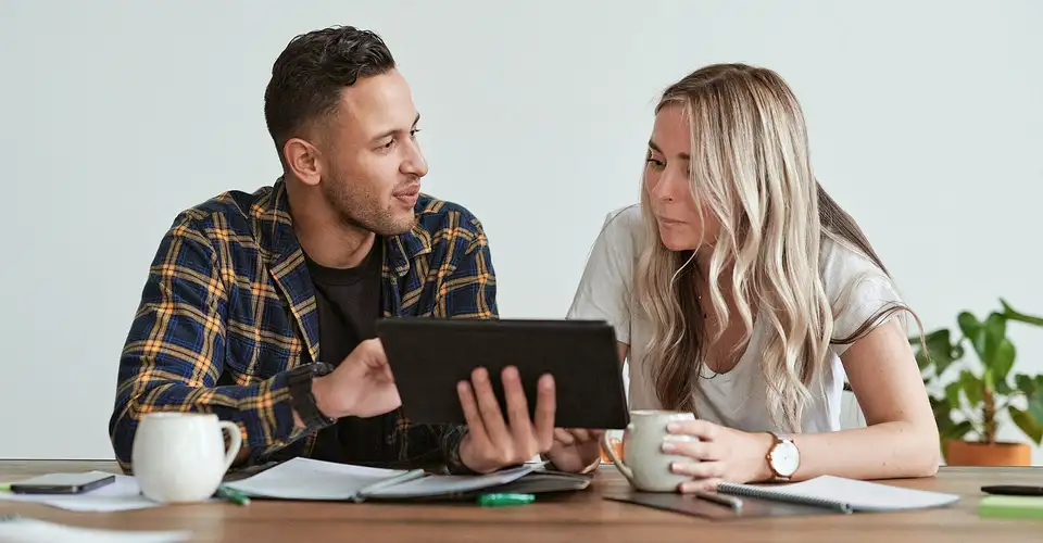 Couple at the table with iPad