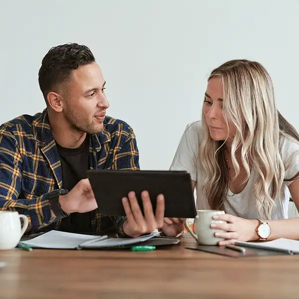 Couple at the table with iPad