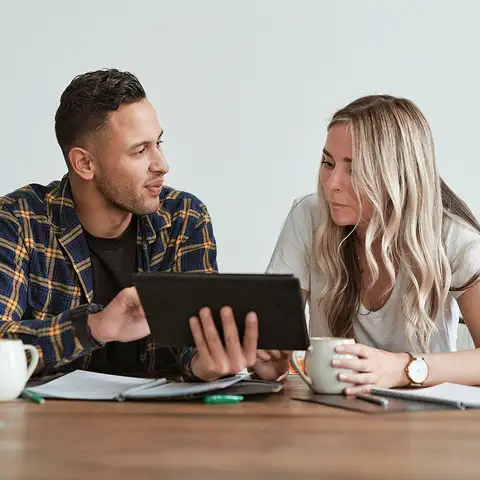 Couple at the table with iPad