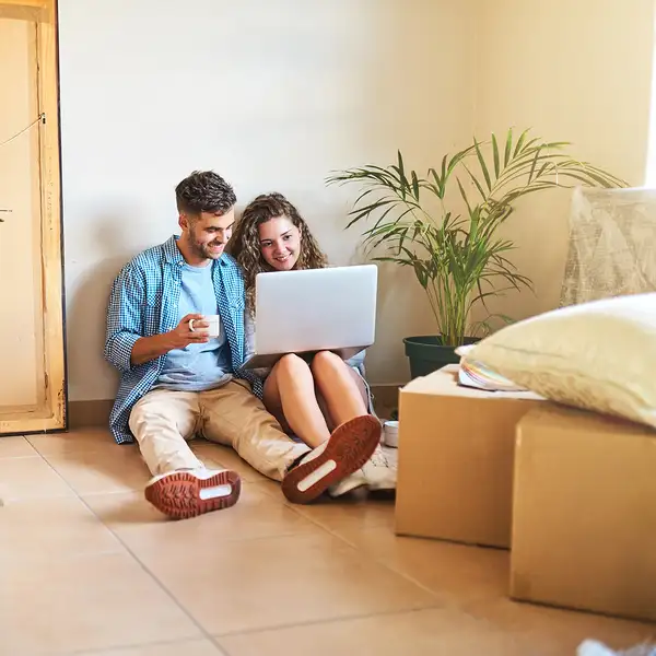 Couple sitting on the floor