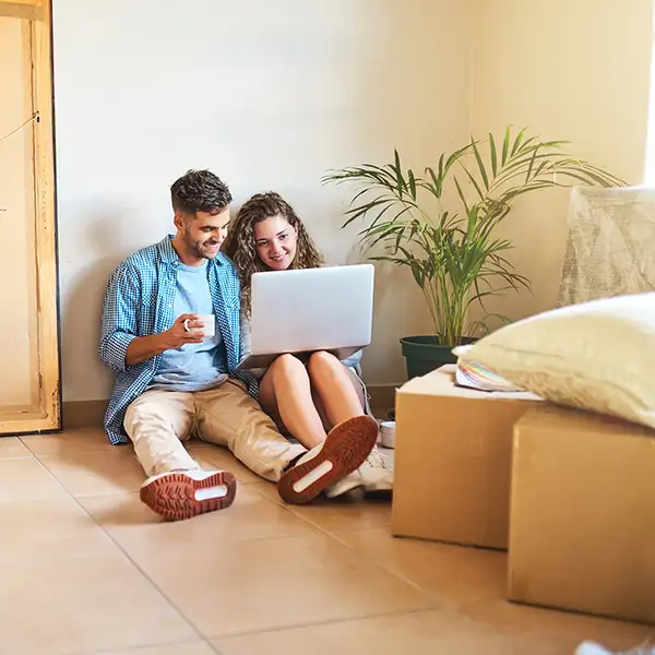 Couple sitting on the floor