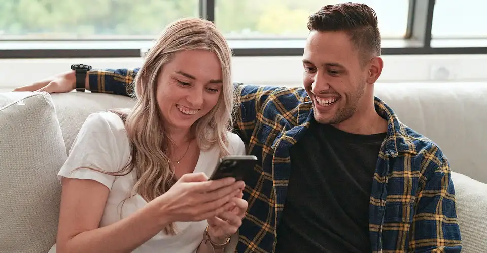 Couple with mobile phone