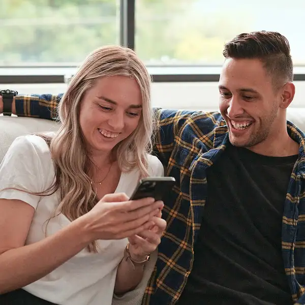 Couple with mobile phone