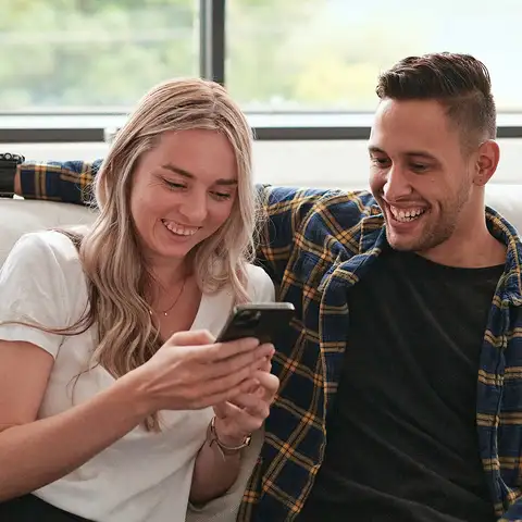 Couple with mobile phone