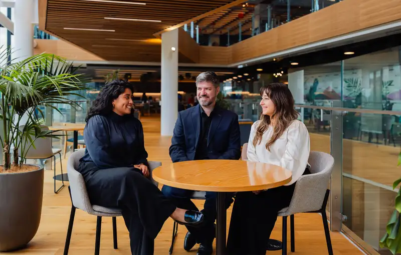 Kiwibank Economists sitting at a table