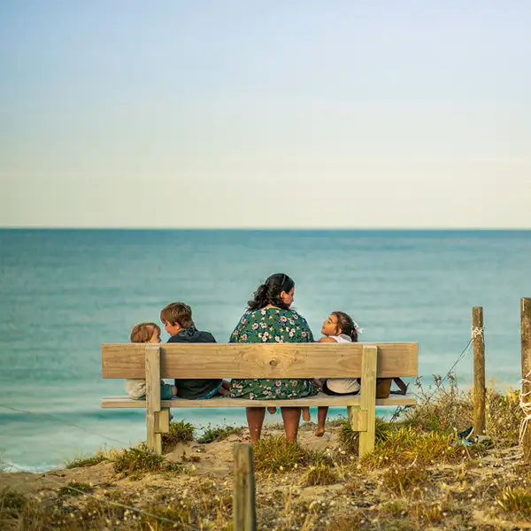 Family sitting on bench