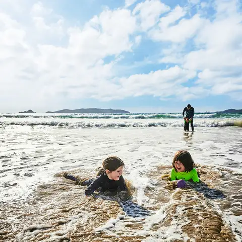 Family swimming in the sea