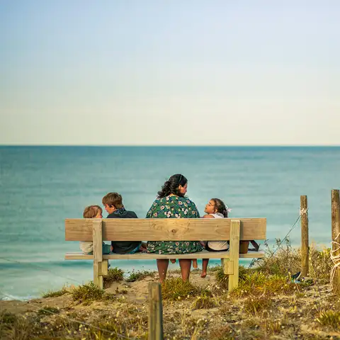 Mum three kids beach