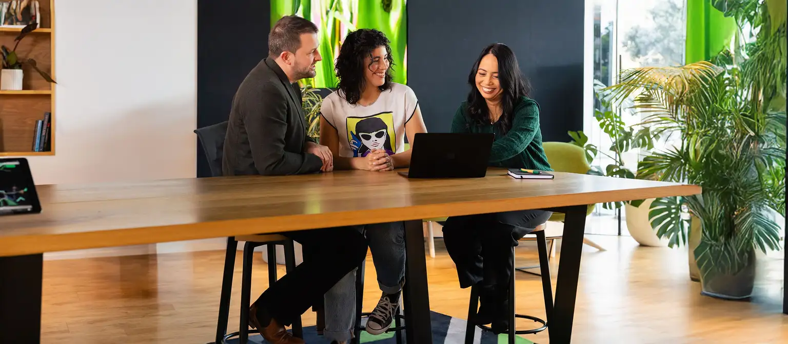 Two people talking with a Kiwibank home loan specialist