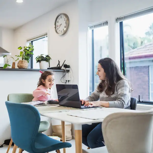 Woman and girl and laptop