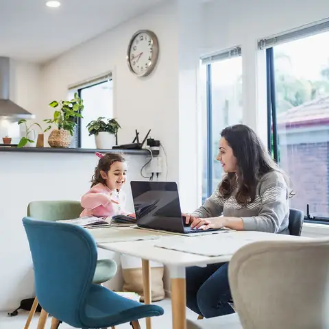 Woman and girl and laptop