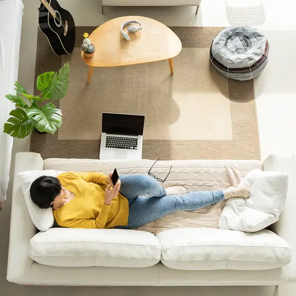 Woman laying on the sofa