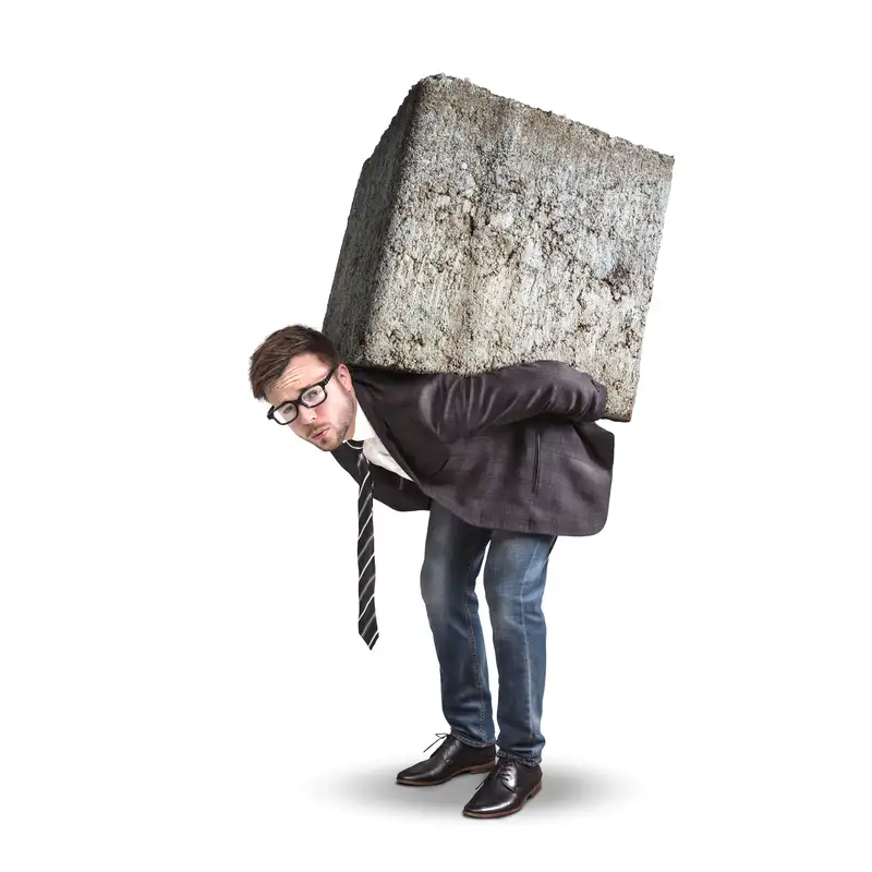 Man labouring under strain of block