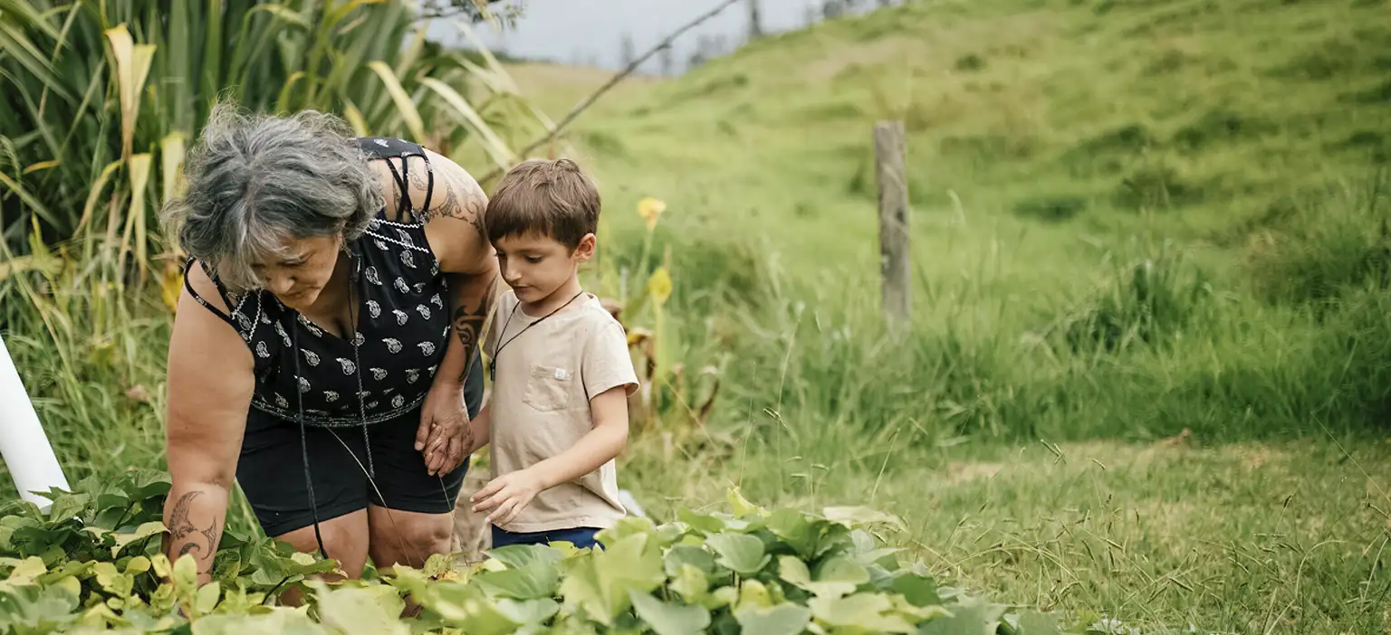 full width promo nan & boy in garden 3072 x 1600